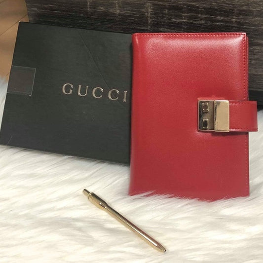 GUCCI ORGANIZER RED WITH PEN EUC