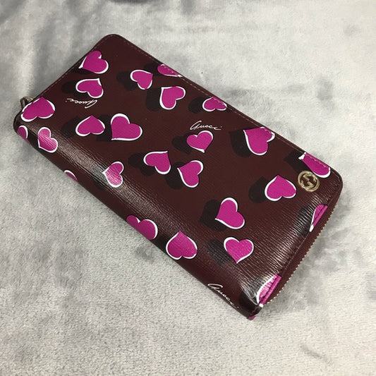 GUCCI ZIP AROUND LONG HEART WALLET MAGENTA